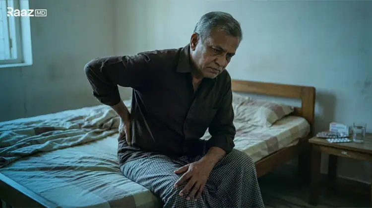 बिस्तर पर कमर दर्द से पीड़ित बुजुर्ग - 50 से ऊपर उम्र में स्तंभन दोष