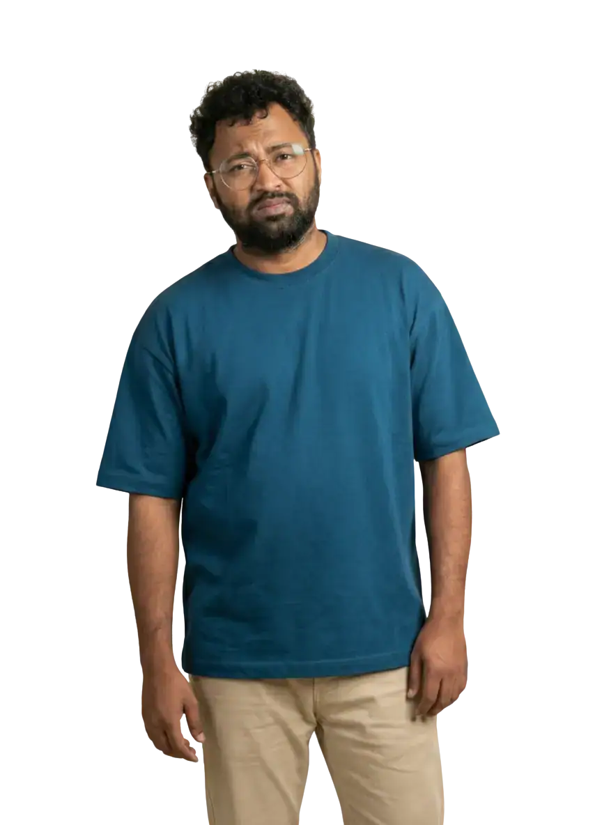 A man standing with his hands at his sides